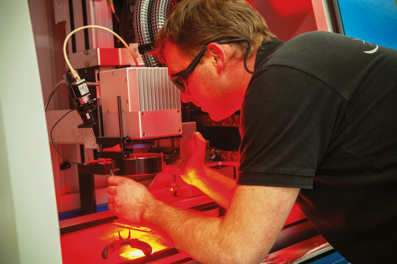 Testing technician at Laser Cheval, Charly Audemard conducts micro-welding tests in his laboratory on different materials